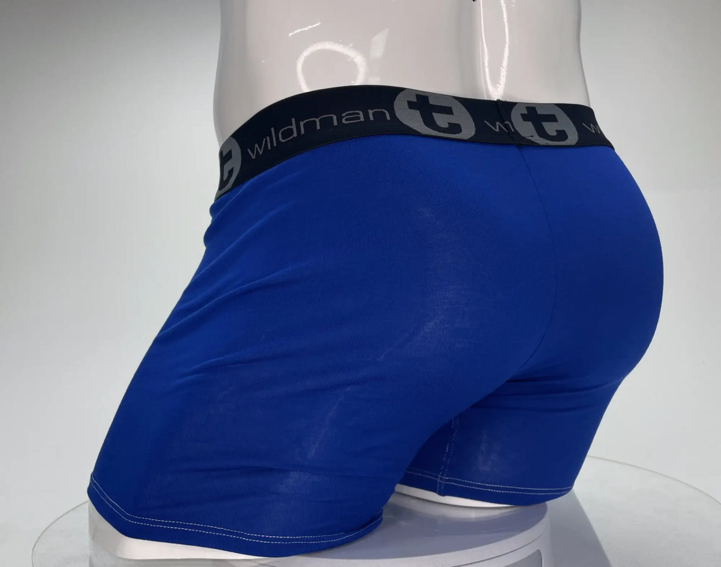 Royal blue WildmanT modal boxer briefs with 5 inch inseam and black waistband featuring Wildman logo and stylized T emblem