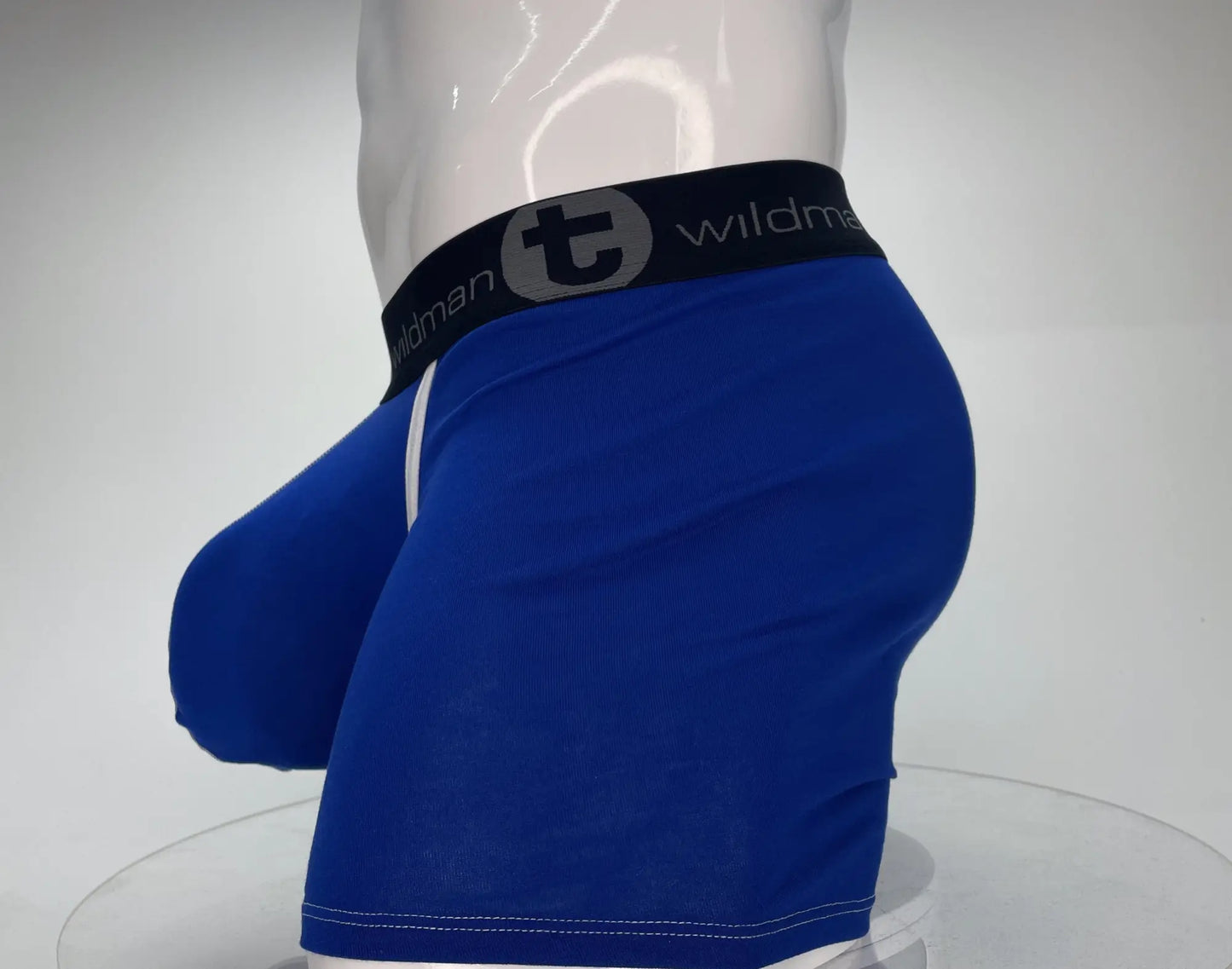 Blue wildman modal boxer briefs with 5 inch inseam royal blue fabric and black elastic waistband with t logo and brand name