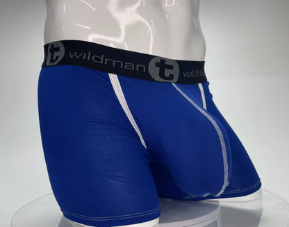 Blue wildman boxer briefs with white stitching and black waistband featuring brand logo in royal blue modal fabric