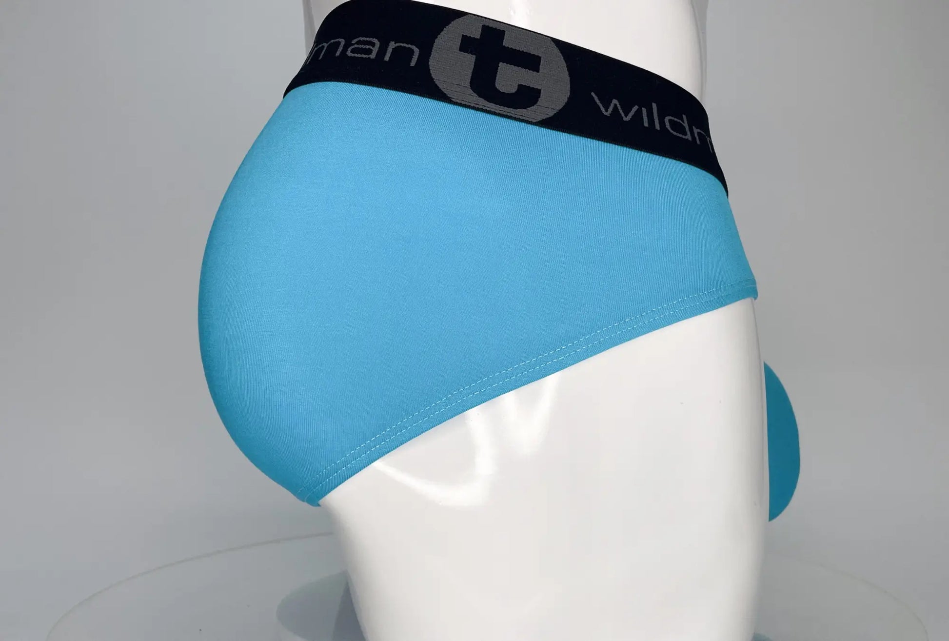 Light blue wildmant modal monster cock brief featuring black elastic waistband with t wild logo