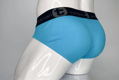 Blue wildman brand modal briefs in baby blue with black elastic waistband featuring t logo and repeating text