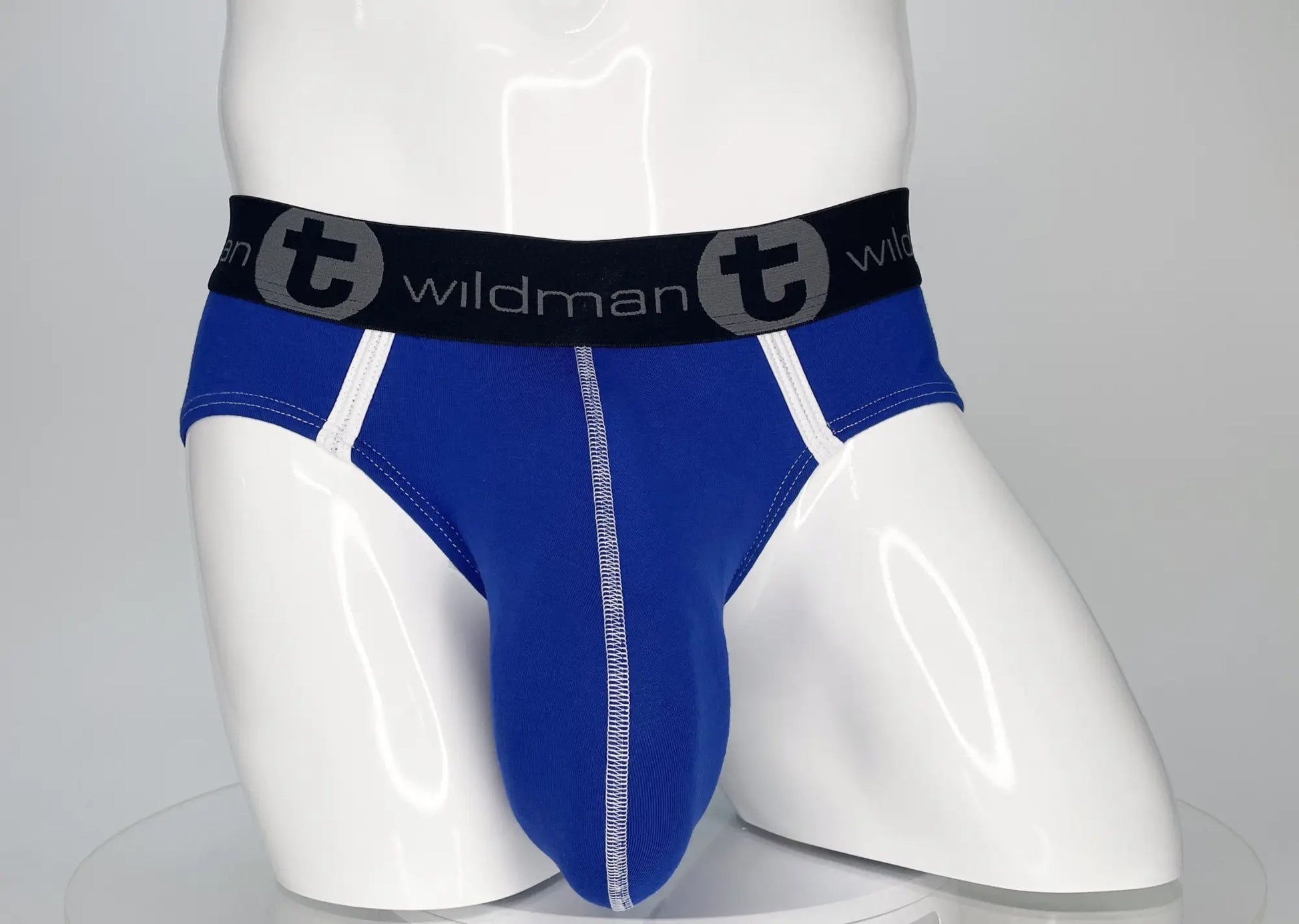 WildmanT modal monster cock brief in royal blue with black waistband featuring t logo and white stitching along seams
