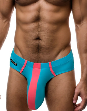 Baby blue WildmanT modal brief with a vertical pink stripe, pink contrast piping, and a branded side tag.