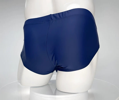 WildmanT monster cock swim brief navy in navy blue with smooth glossy fabric finish ideal for swimming and beachwear