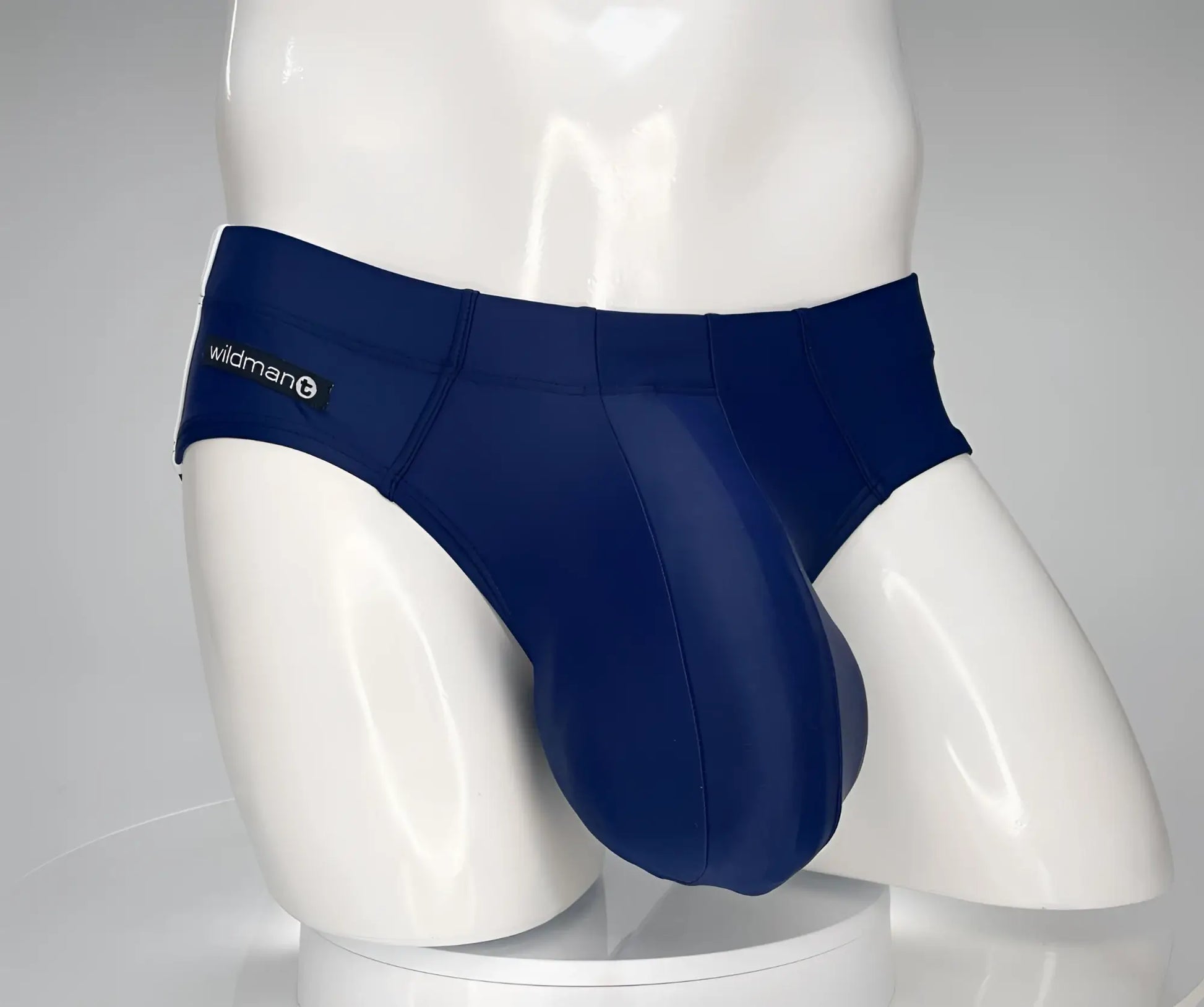 Navy blue wildman brand men’s briefs with smooth form-fitting design from wildmant monster cock swim brief navy collection
