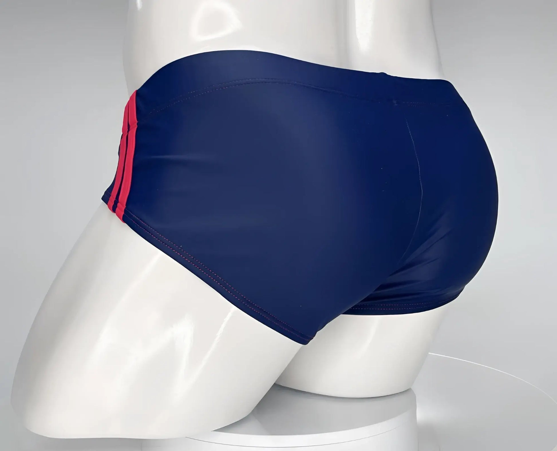 Wildmant monster cock swim brief navy blue swim trunks with red side stripes designed for swimming and beachwear