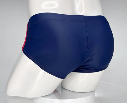 Wildmant monster cock swim brief navy with red side stripe designed for swimming and water activities