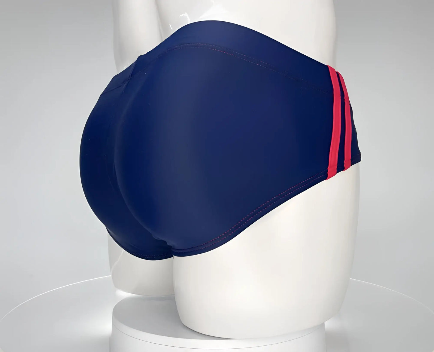 WildmanT Monster Cock swim brief in navy with bold red side stripes made for comfortable swimwear use