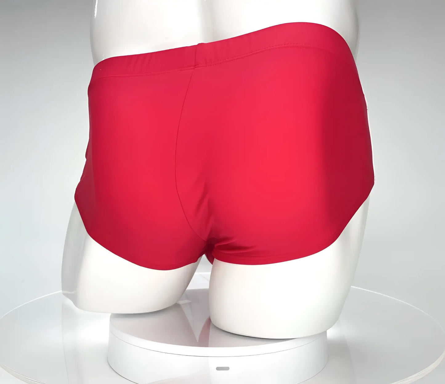 Bright red wildmant monster cock swim brief made of smooth stretchy fabric with a classic cut