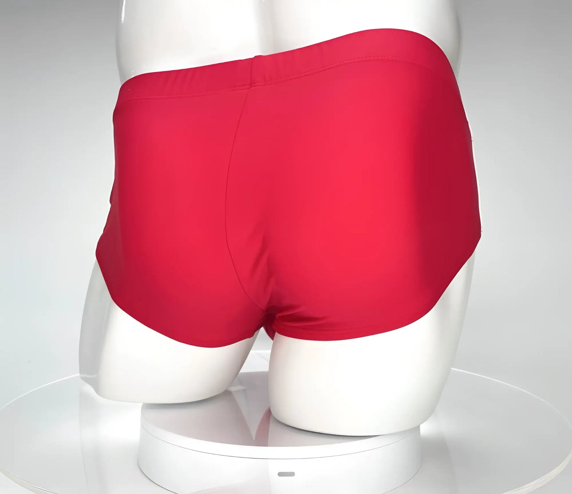 Bright red wildmant monster cock swim brief made of smooth stretchy fabric with a classic cut