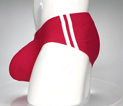 Wildmant monster cock swim brief red swim trunks with three white stripes on the side displayed on a mannequin