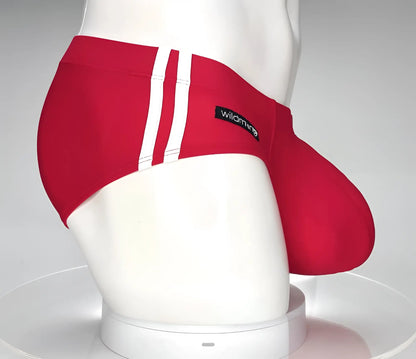 Wildmango monster cock swim brief red swim trunks with white vertical stripes and black wildmango brand label