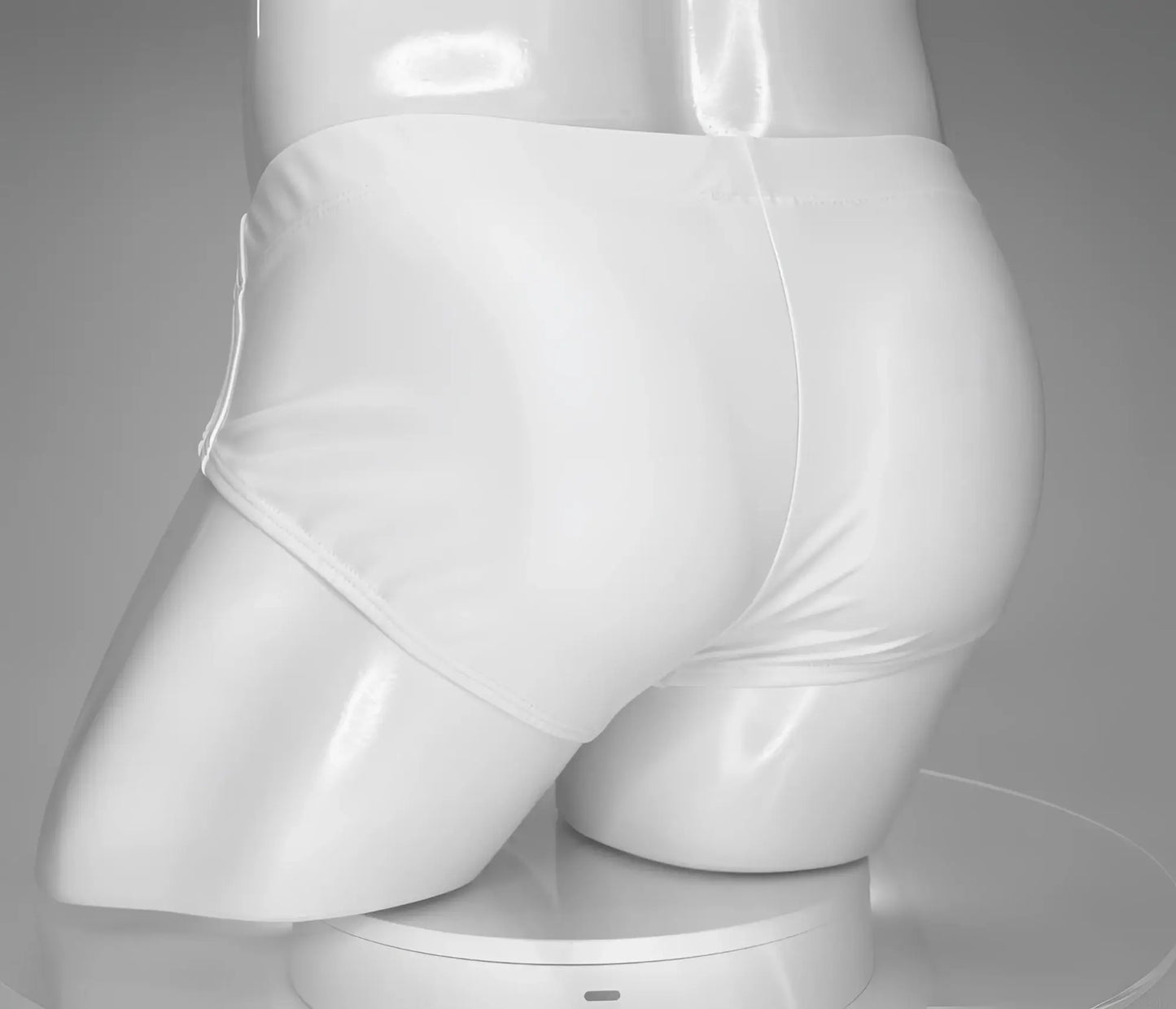 White glossy swim briefs with wildmant monster cock design displayed on mannequin front view