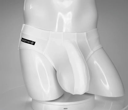 White glossy men’s swim briefs with a black wildman brand label on the waistband from wildmant monster cock line