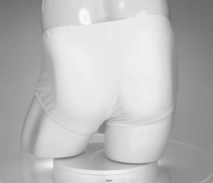 White briefs swim brief by wildmant featuring a monster cock design displayed on a mannequin front view
