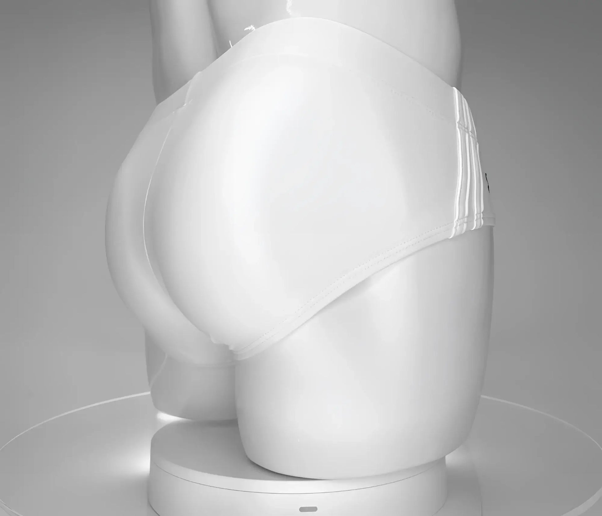 Wildmant monster cock swim brief white seamless briefs with smooth form fitting design and subtle elastic waistband detailing