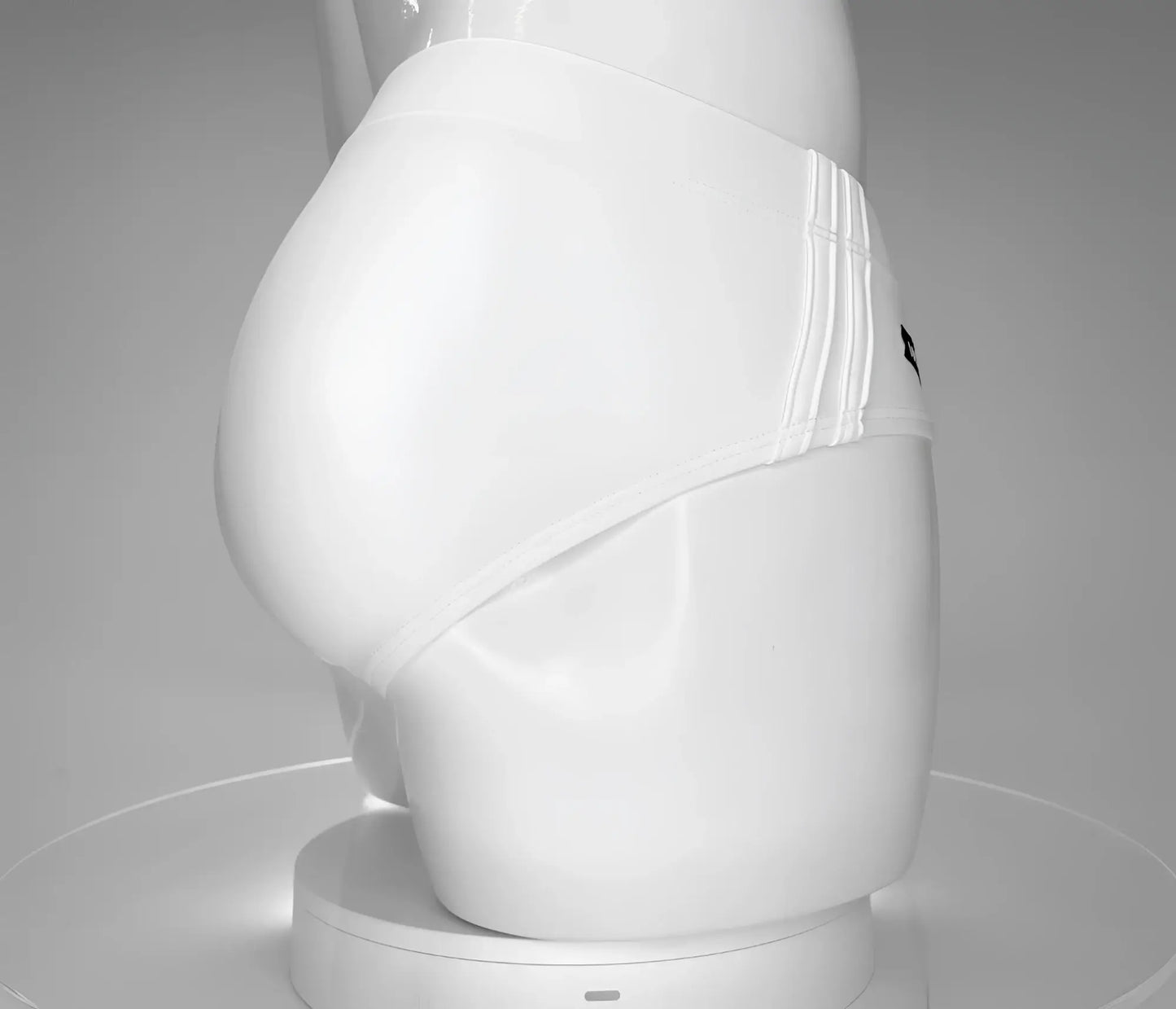Wildmant monster cock swim brief white with smooth form-fitting design and subtle vertical stitching on side seam