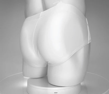 Wildmant monster cock swim brief white smooth textured white swim briefs displayed on a mannequin front side