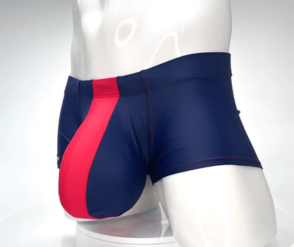 Navy blue WildmanT Monster Cock swim square cut trunks with bold red diagonal stripe for swimming and beachwear