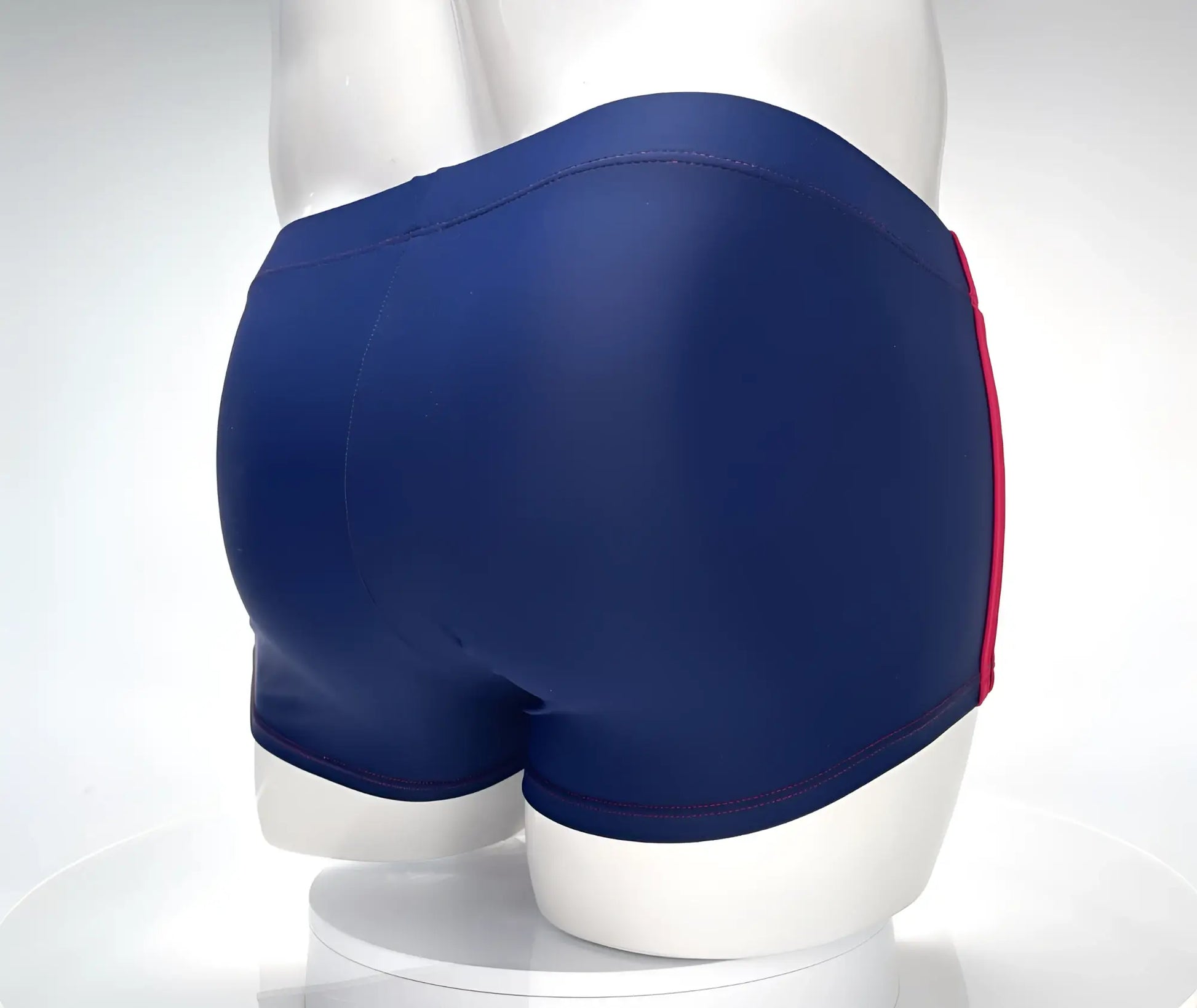 WildmanT Monster Cock swim square cut trunks in navy blue with a red side stripe for swimming and beachwear