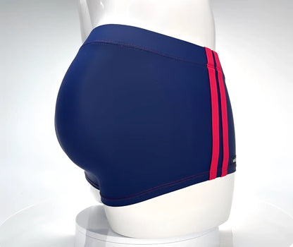 WildmanT monster cock swim square cut navy swim trunks with bold red side stripes for beach and pool use