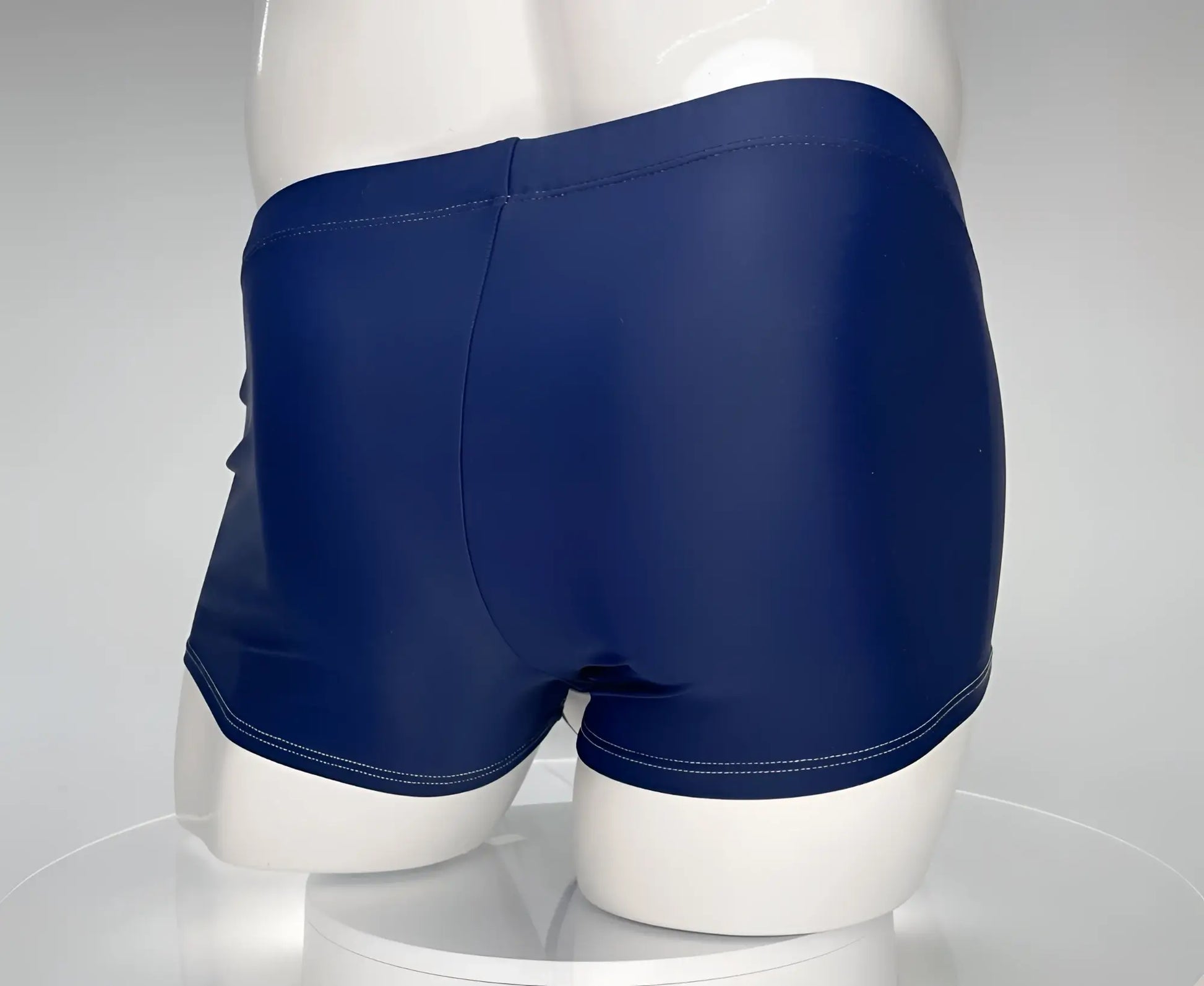 WildmanT Monster Cock navy swim square cut trunks with glossy finish and contrasting white stitching along hem