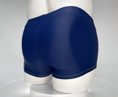 Navy blue WildmanT monster cock swim square cut trunks with smooth glossy finish and white stitching along hem