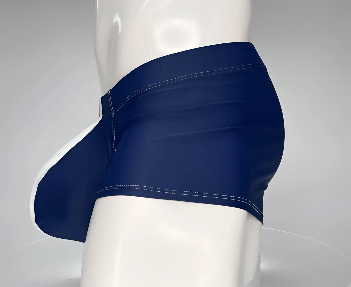 Wildmant monster cock swim square cut navy blue swim trunks with white trim and contrasting stitching