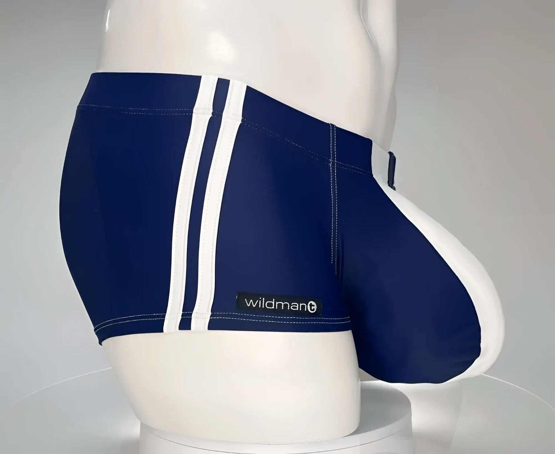Navy blue WildmanT Monster Cock swim square cut trunks with white side stripes and wildman brand label