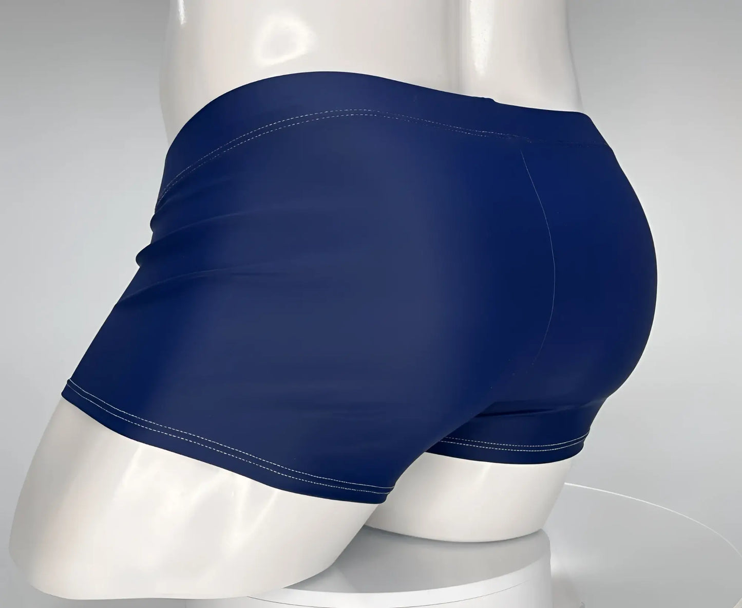 WildmanT monster cock swim square cut navy swim trunks with white stitching along hem and waistband