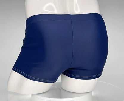 WildmanT monster cock swim square cut navy swim trunks with white stitching along waistband and hem