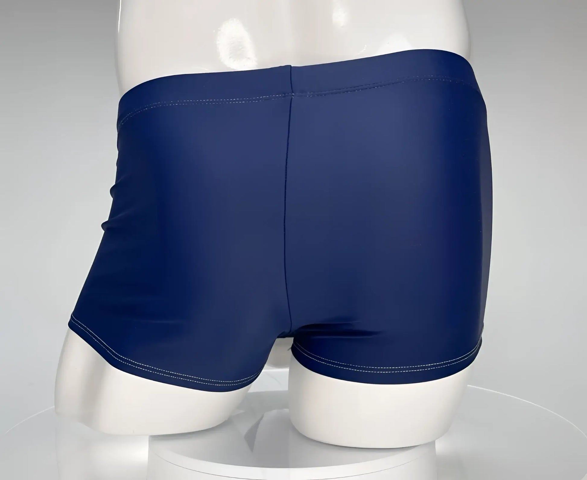 Wildmant monster cock swim square cut navy swim trunks with white stitching along waistband and leg openings