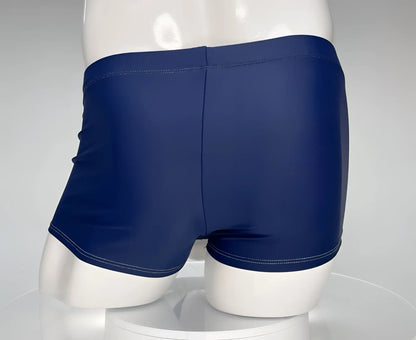 Wildmant monster cock swim square cut navy swim trunks with white stitching along waistband and leg openings
