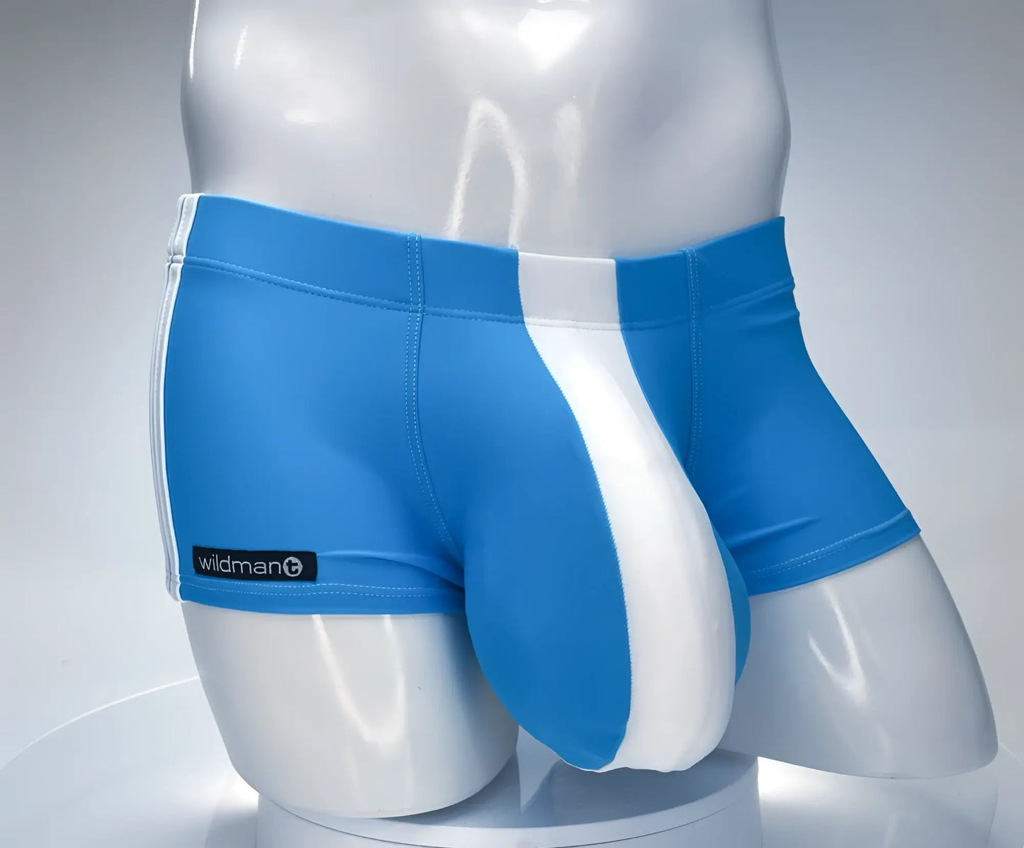 Wildmant monster cock swim square cut athletic briefs in teal and white with a sleek form-fitting design