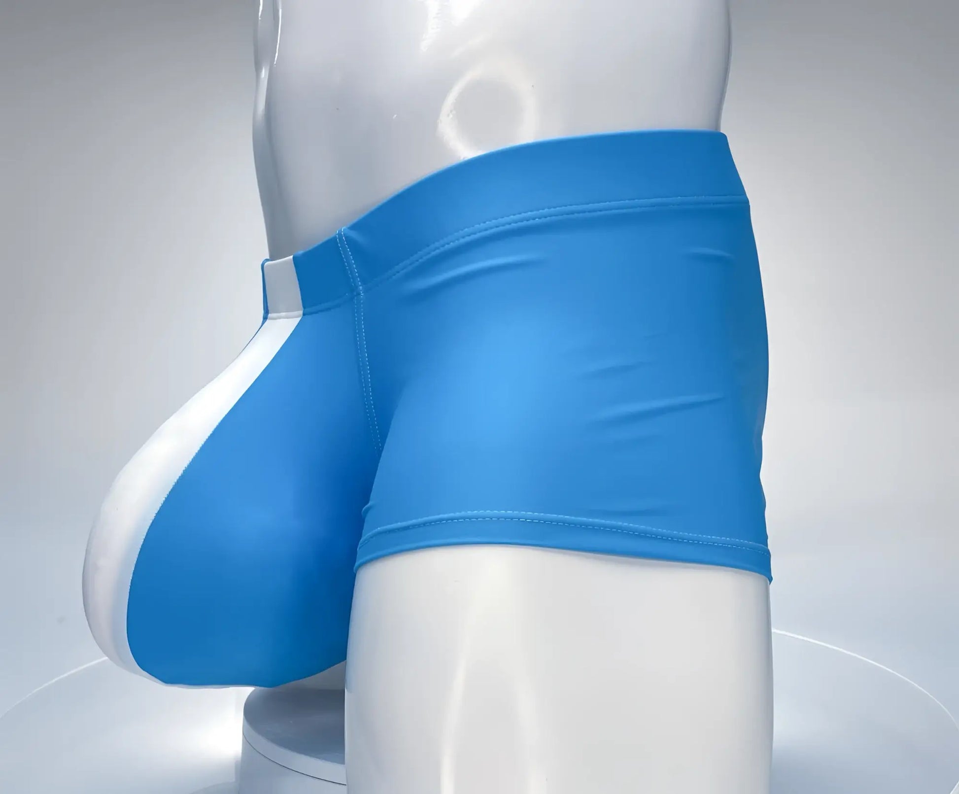 Wildmant monster cock swim square cut teal and white athletic briefs with sleek form-fitting design