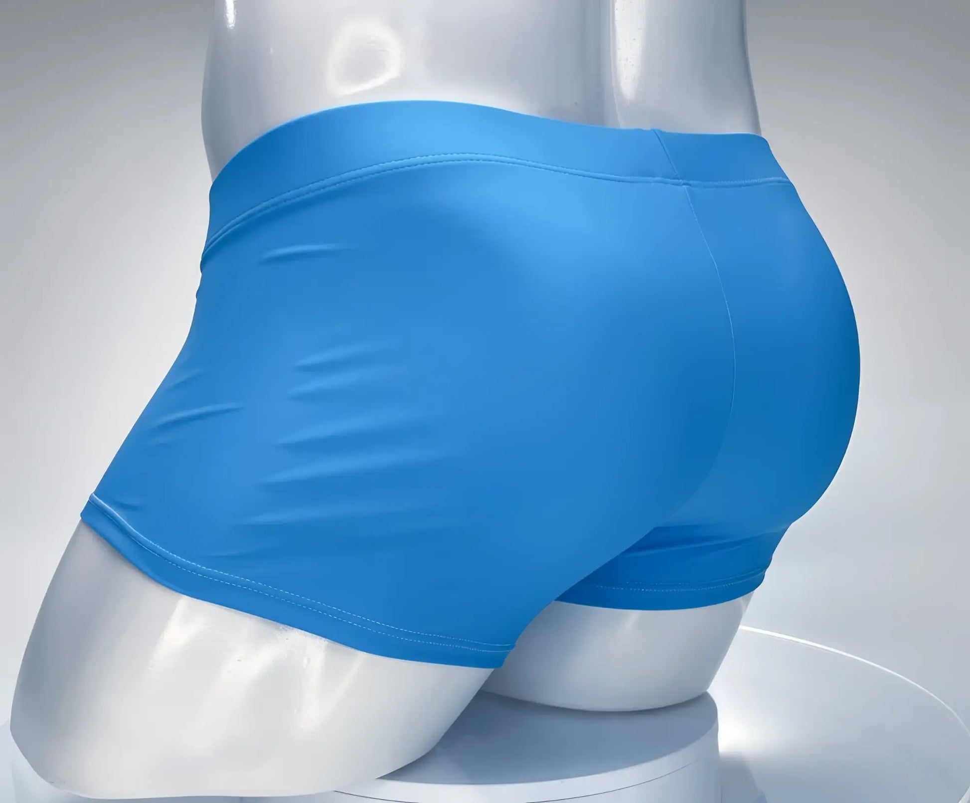 Bright blue form-fitting WildmanT Monster Cock swim square cut shorts with stretchy fabric and snug waistband