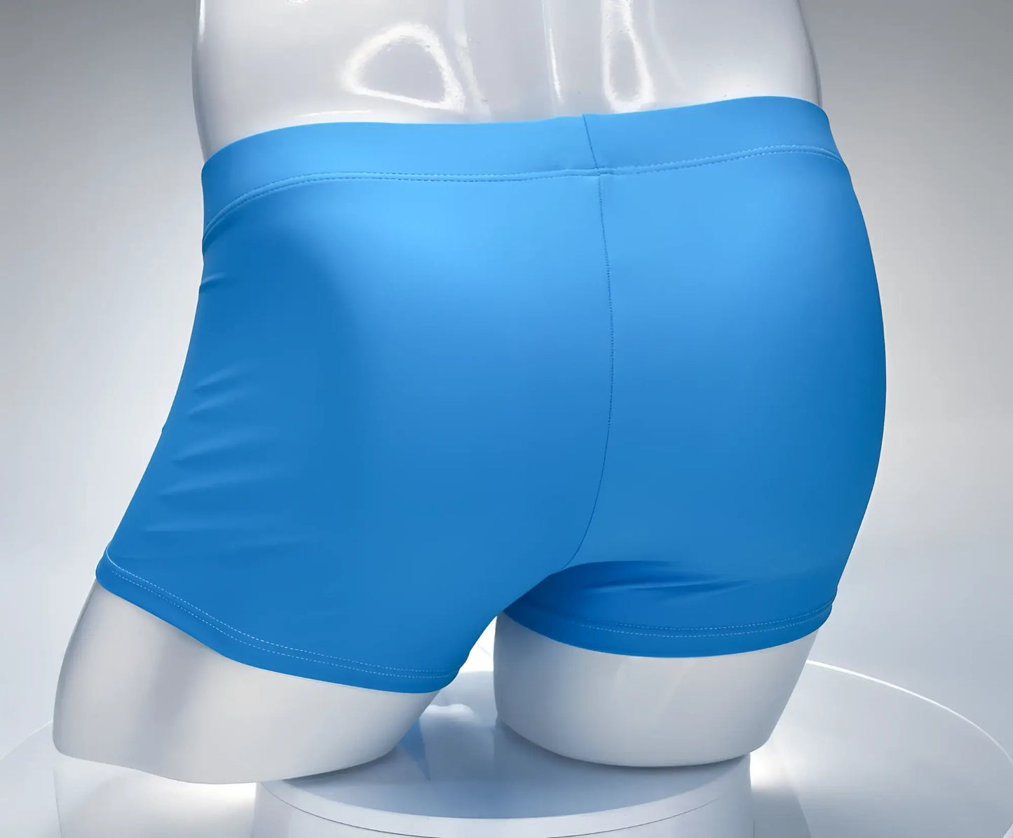 Bright blue smooth-fitting WildmanT Monster Cock swim square cut boxer briefs displayed on a mannequin front view