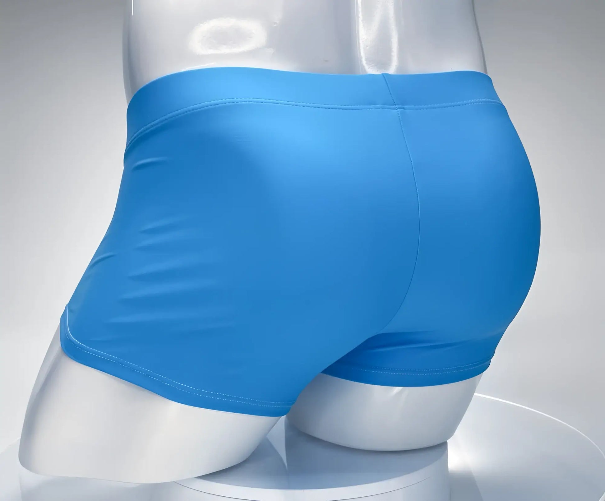 Bright blue smooth-finish wildmant monster cock swim square cut men’s boxer briefs displayed on a mannequin