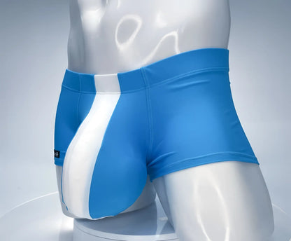 WildmanT monster cock swim square cut bright blue trunks with bold white diagonal stripe made from smooth stretchy fabric