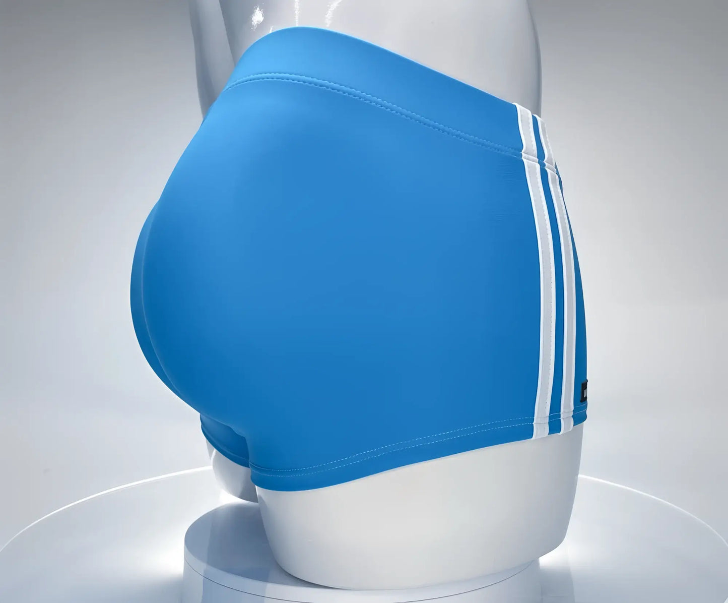 Wildmant monster cock swim square cut bright blue swim trunks with three white stripes displayed on mannequin