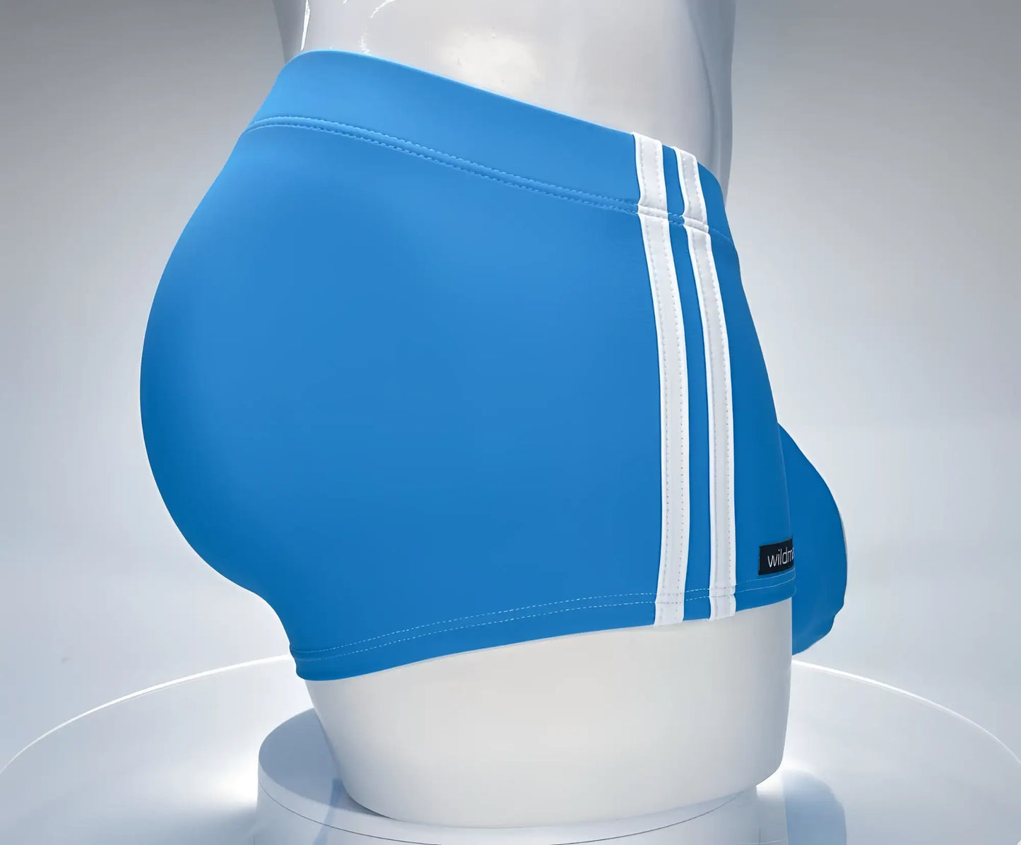 WildmanT monster cock swim square cut teal swim trunks with three white stripes and a snug fit featuring a black tag