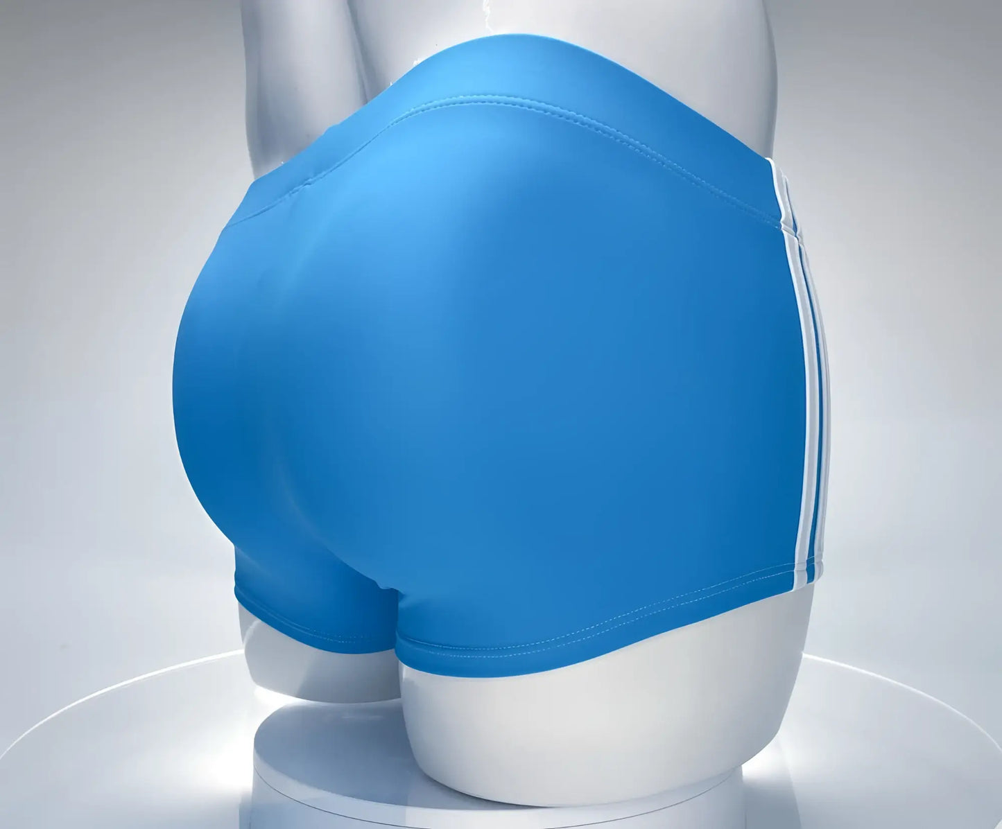 Bright blue WildmanT Monster Cock swim square cut trunks with white side stripes displayed on a mannequin