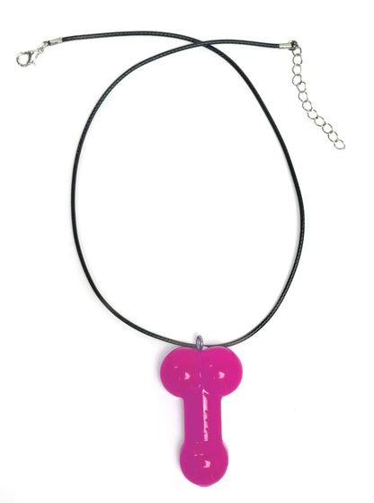 WildmanT penis necklace featuring a bright pink pendant on a black cord, shown from a front-facing studio view.
