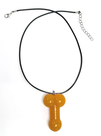 WildmanT orange penis-shaped resin pendant on a black cord necklace, front view isolated on white.