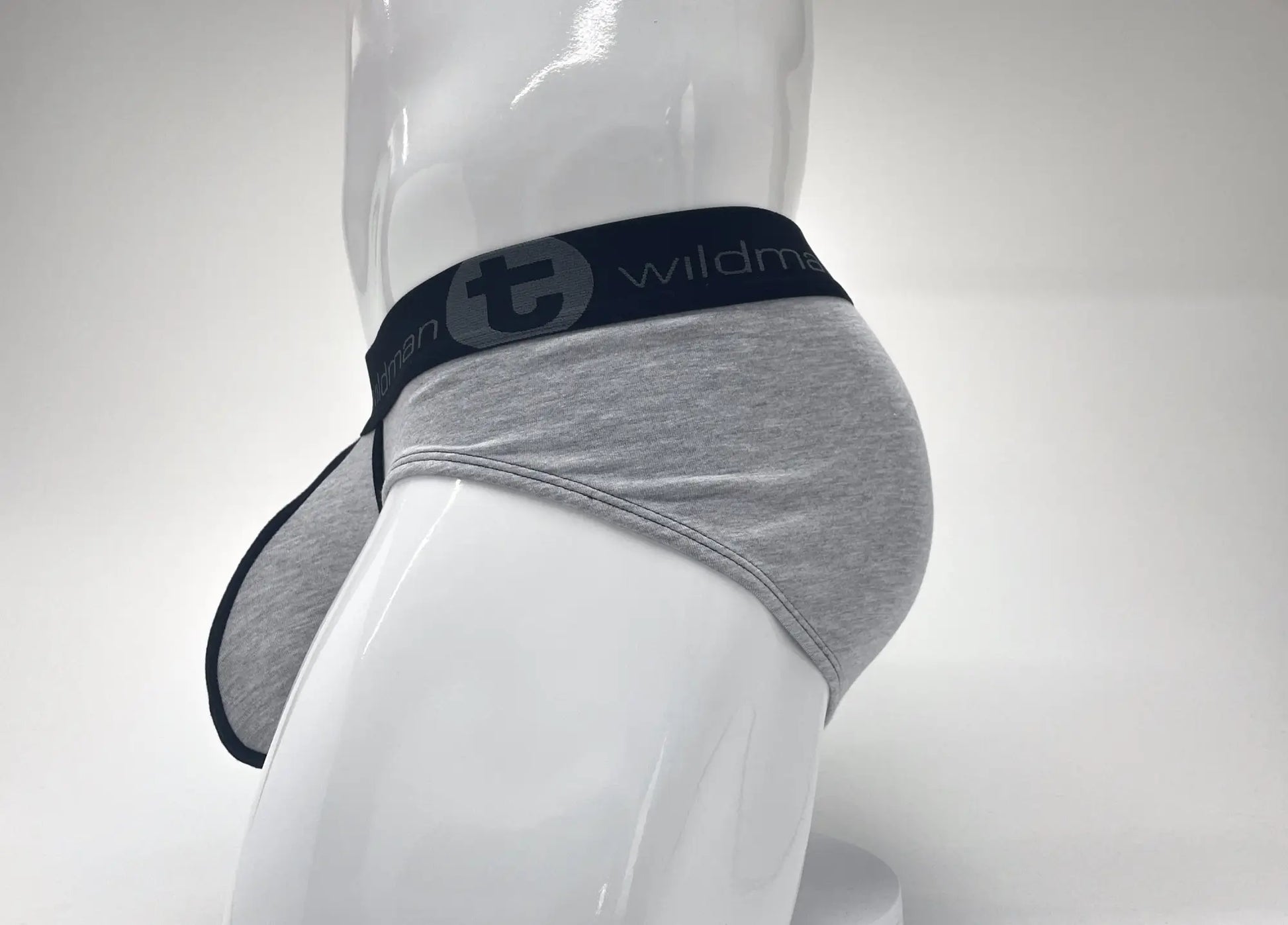 Gray heathered stretch cotton big boy pouch briefs with black elastic waistband featuring wildman logo
