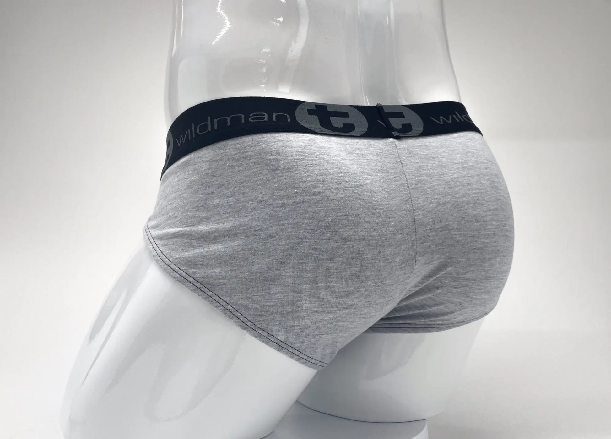 Gray heathered stretch cotton briefs with black elastic waistband featuring wildman brand name and logo