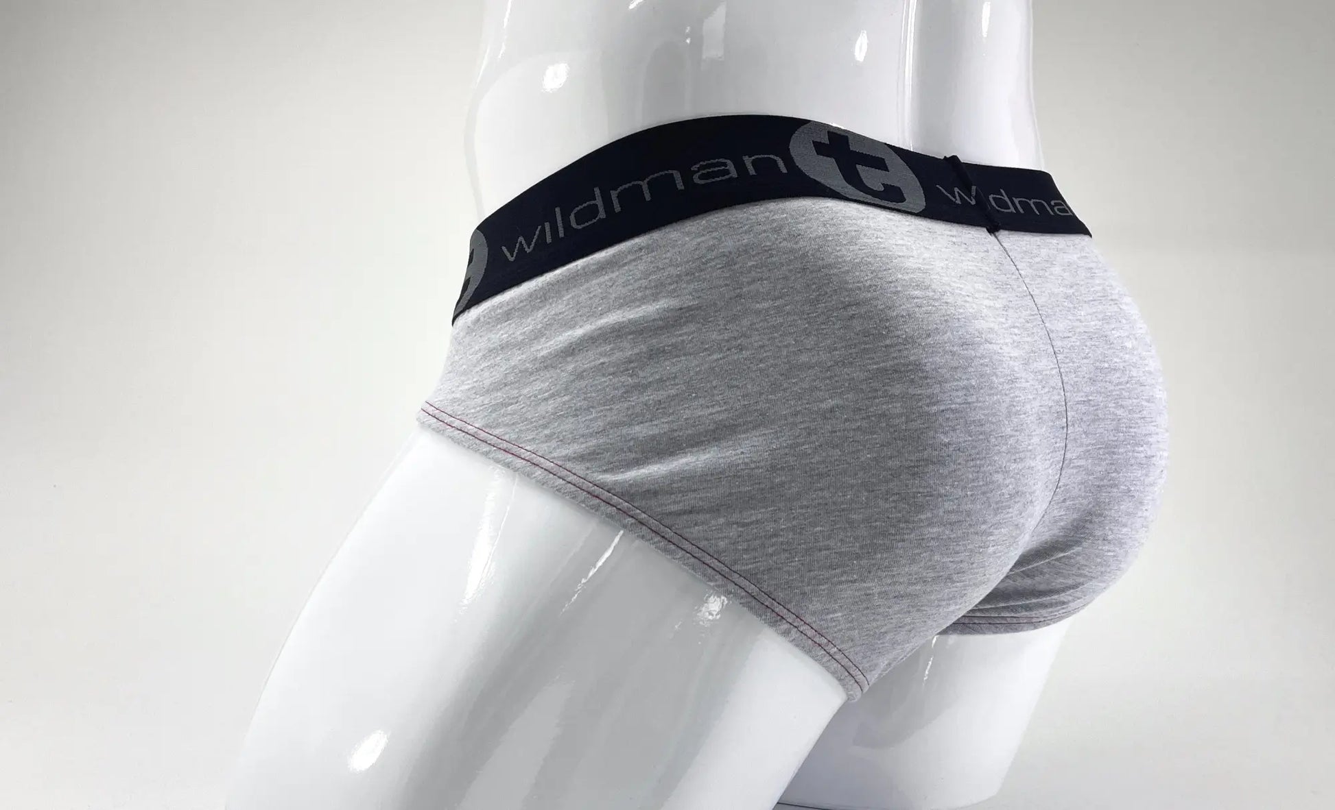 Gray heathered stretch cotton big boy pouch briefs with black wildman logo waistband in gray and red