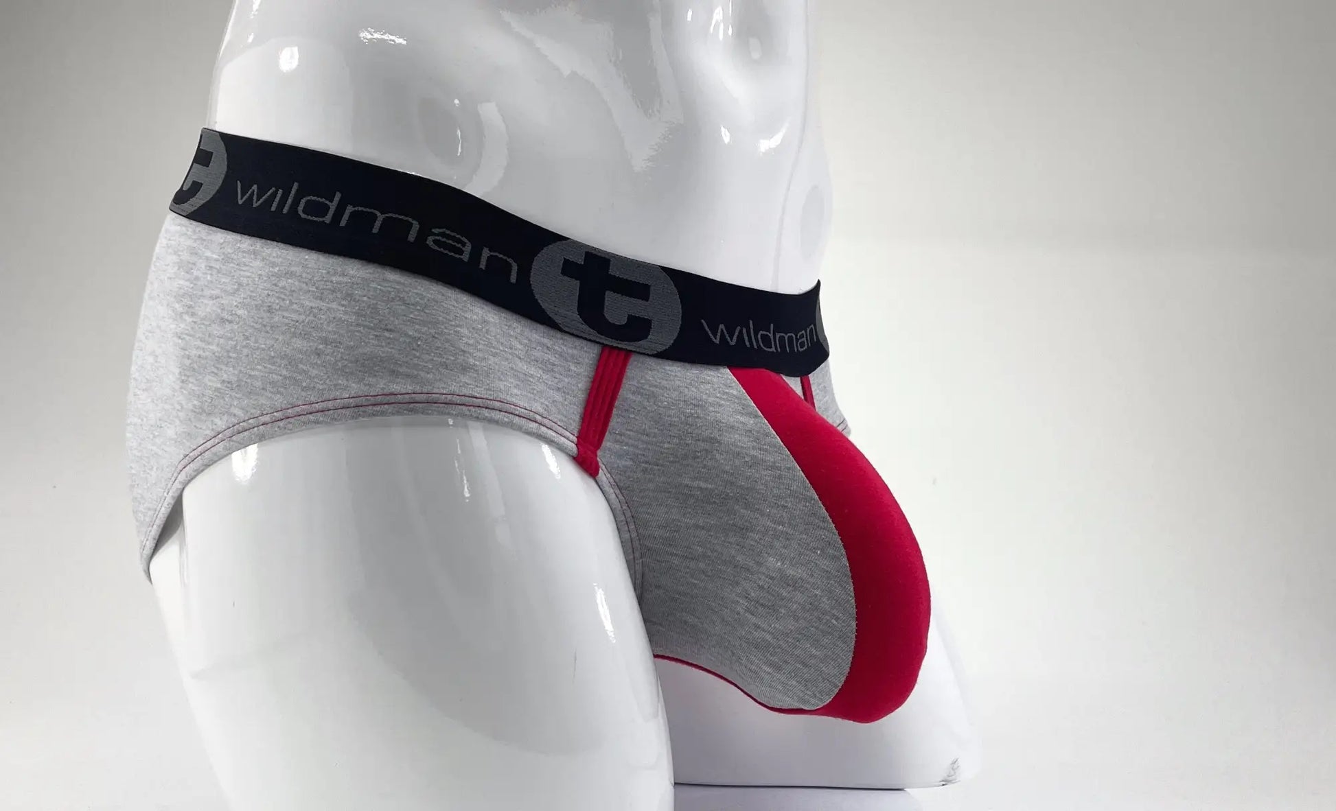 Wildmant stretch cotton big boy pouch brief in gray and red with black waistband featuring wildman logo