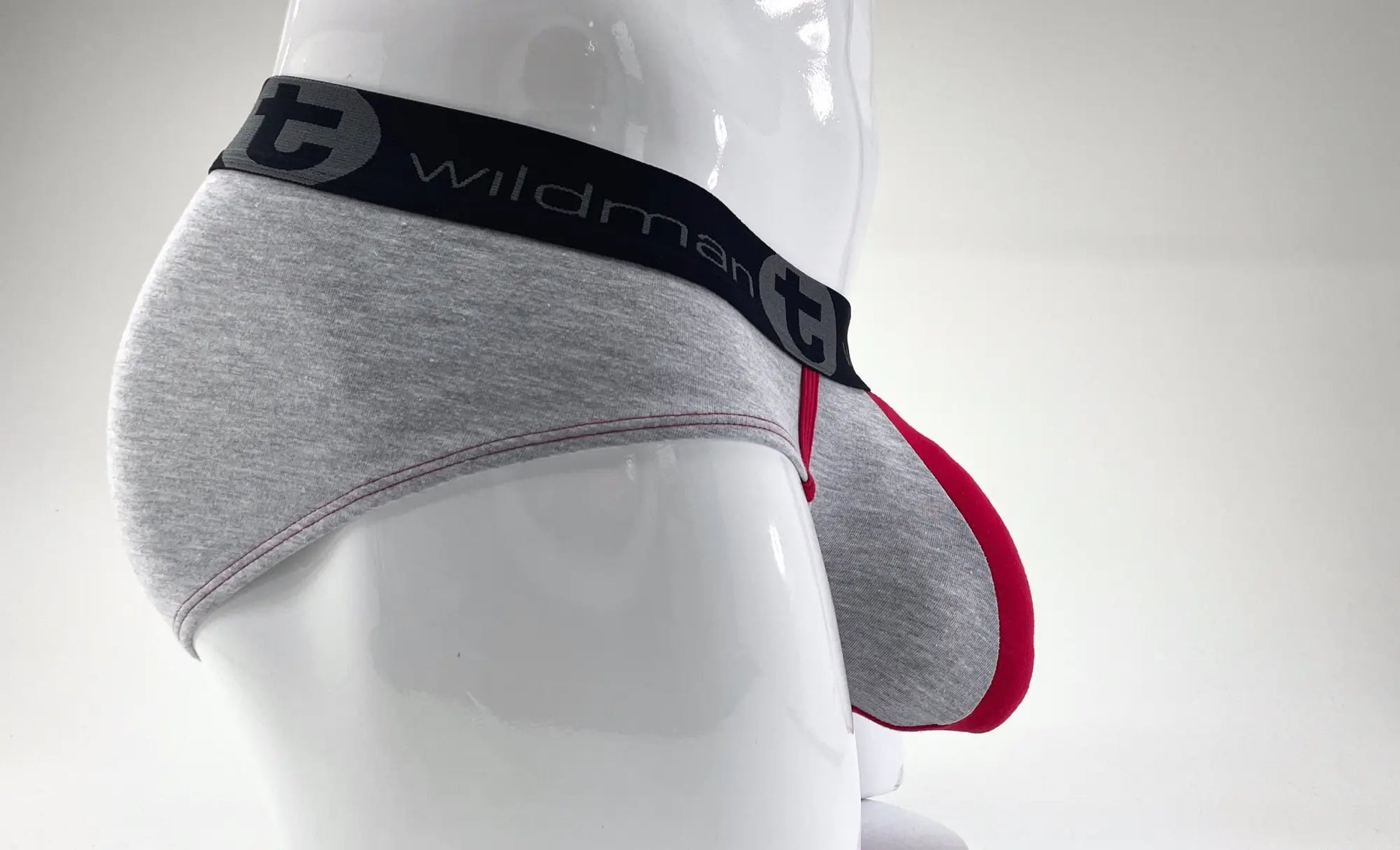 Wildmant stretch cotton big boy pouch brief in gray and red with black waistband featuring wildman logo