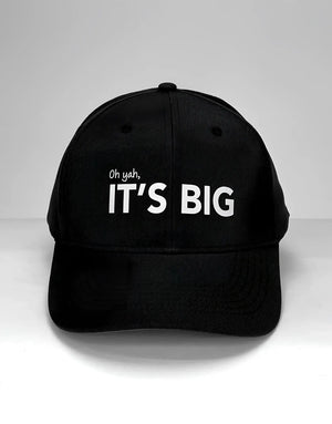 Black baseball cap featuring the text "Oh yah, IT'S BIG" embroidered in white on the front.